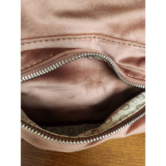 Guess small velvet feel pink backpack with black straps and pom. Measures approx main image 10